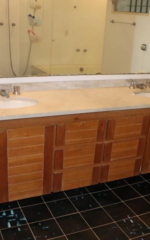 Casa de condomínio para alugar com 750m², 5 quartos e 6 vagasBanheiro da Suíte 3