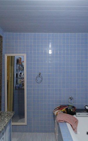 Casa de condomínio à venda com 260m², 3 quartos e 2 vagasBanheiro da suíte 1