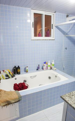 Casa de condomínio para alugar com 260m², 3 quartos e 2 vagasBanheiro da Suíte 1