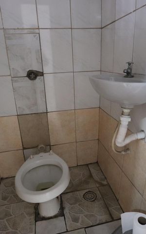 Casa à venda com 209m², 3 quartos e 7 vagasBanheiro de serviço