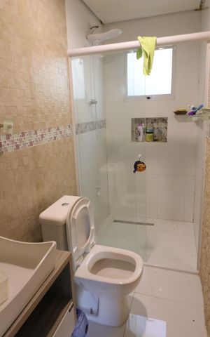Casa à venda com 150m², 3 quartos e 2 vagasBanheiro da Suíte 1