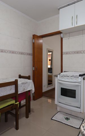 Casa à venda com 119m², 2 quartos e 2 vagasCozinha 1