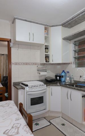 Casa à venda com 119m², 2 quartos e 2 vagasCozinha 1