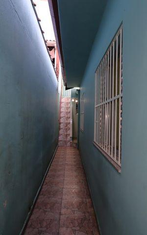 Casa à venda com 119m², 2 quartos e 2 vagasCorredor externo