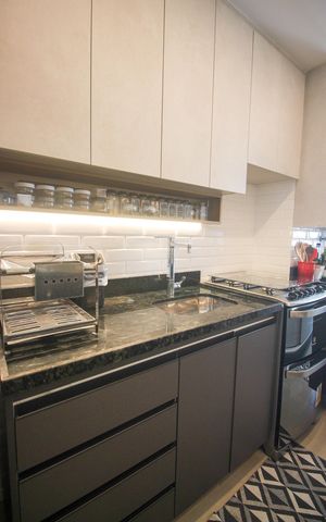 Apartamento à venda com 62m², 2 quartos e 1 vagaCozinha e Área de Serviço