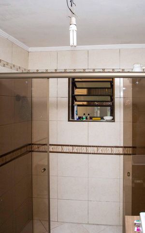 Casa à venda com 252m², 3 quartos e 2 vagasBanheiro 3