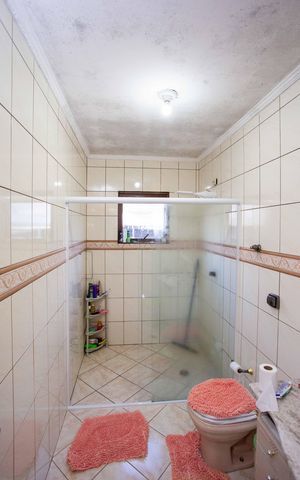 Casa à venda com 252m², 3 quartos e 2 vagasBanheiro 1