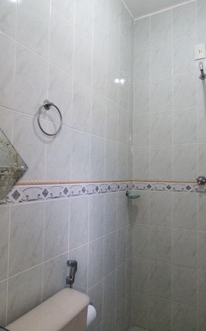 Casa de condomínio à venda com 242m², 4 quartos e 1 vagaBanheiro da suíte 2