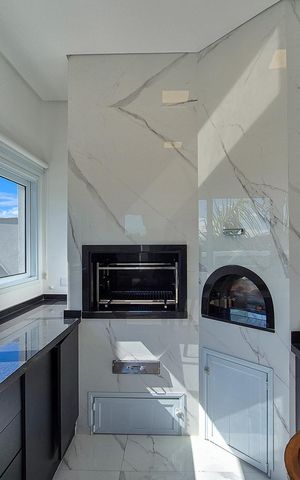 Casa de condomínio à venda com 464m², 4 quartos e 6 vagasChurrasqueira