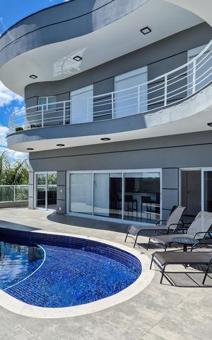 Casa de condomínio à venda com 464m², 4 quartos e 6 vagasPiscina