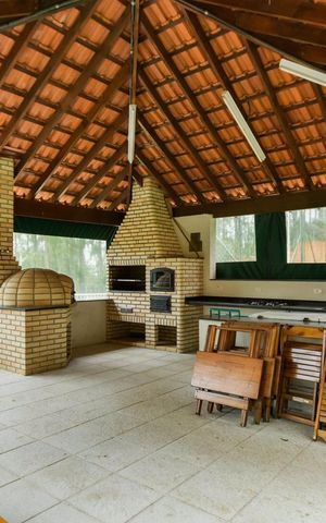 Casa de condomínio à venda com 464m², 4 quartos e 6 vagas Casa de condomínio à venda com 464m², 4 quartos e 6 vagasÁrea comum - Churrasqueira