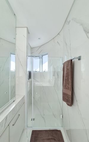 Casa de condomínio à venda com 464m², 4 quartos e 6 vagasBanheiro da Suíte 4