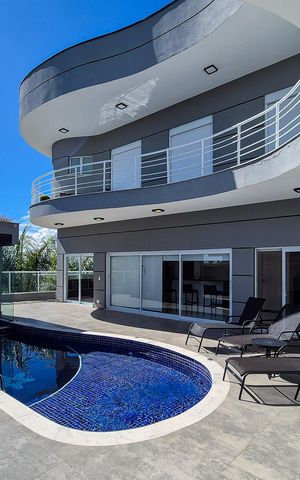 Casa de condomínio à venda com 464m², 4 quartos e 6 vagasPiscina