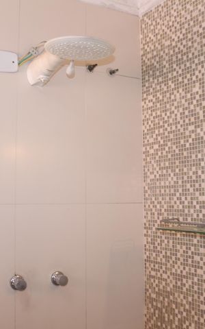 Casa à venda com 306m², 3 quartos e 5 vagasBanheiro da Suíte 1
