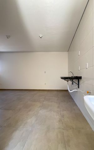 Apartamento à venda com 44m², 2 quartos e 1 vaga Apartamento à venda com 44m², 2 quartos e 1 vagaCozinha e Área de Serviço