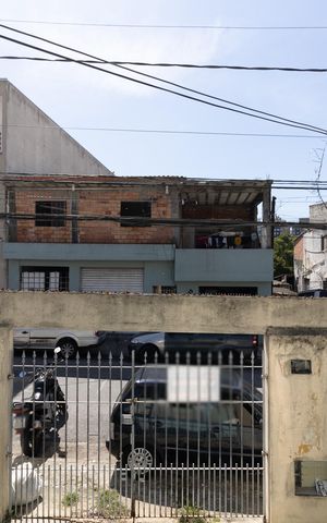 Casa à venda com 200m², 2 quartos e 3 vagas Casa à venda com 200m², 2 quartos e 3 vagasVista do Quarto da Casa 1
