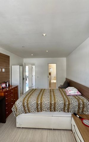 Casa de condomínio à venda com 290m², 6 quartos e 2 vagas Casa de condomínio à venda com 290m², 6 quartos e 2 vagasSuite 1
