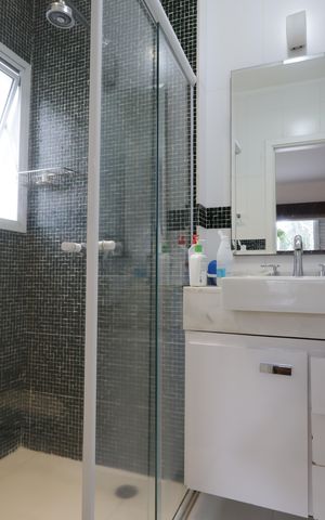 Casa de condomínio à venda com 420m², 4 quartos e 7 vagasBanheiro da Suíte 2