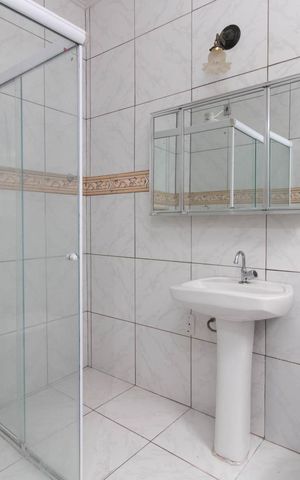 Casa à venda com 298m², 3 quartos e 2 vagasBanheiro da Suíte
