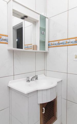 Casa à venda com 298m², 3 quartos e 2 vagasBanheiro 1