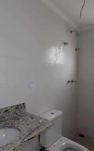 Apartamento à venda com 55m², 2 quartos e 2 vagasBanheiro da Suíte
