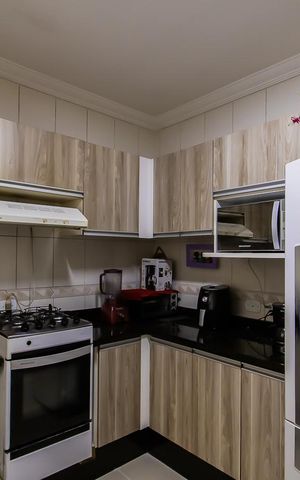 Casa à venda com 102m², 3 quartos e 2 vagas Casa à venda com 102m², 3 quartos e 2 vagasCozinha