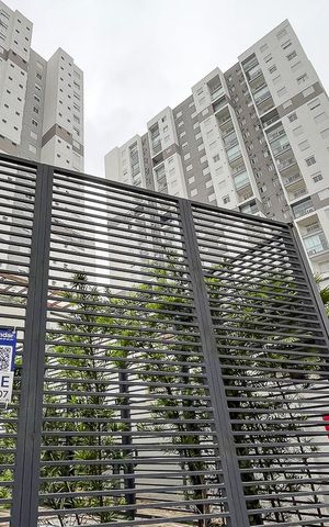 Apartamento à venda com 70m², 2 quartos e 2 vagasFachada + plaquinha