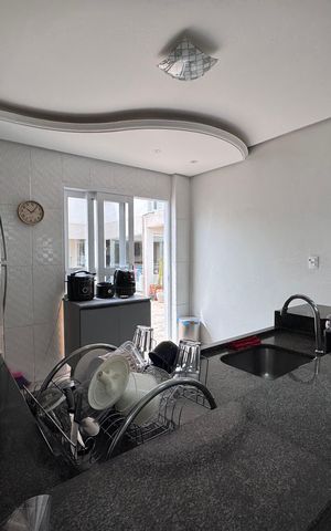 Casa à venda com 262m², 4 quartos e 3 vagas Casa à venda com 262m², 4 quartos e 3 vagasCozinha