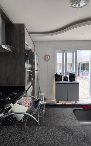 Casa à venda com 262m², 4 quartos e 3 vagas Casa à venda com 262m², 4 quartos e 3 vagasCozinha