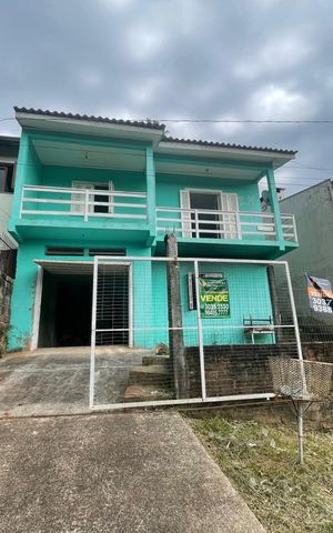 Casa à venda com 106m², 2 quartos e 2 vagas Casa à venda com 106m², 2 quartos e 2 vagasFachada