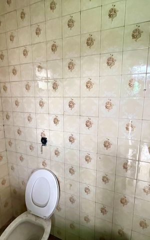 Casa à venda com 400m², 6 quartos e 8 vagasBanheiro 3