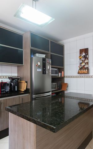 Casa à venda com 100m², 2 quartos e 2 vagas Casa à venda com 100m², 2 quartos e 2 vagasCozinha