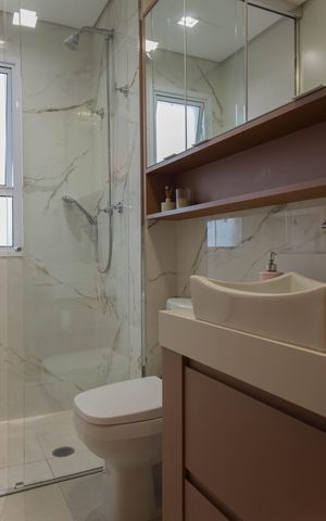 Apartamento à venda com 128m², 3 quartos e 3 vagas Apartamento à venda com 128m², 3 quartos e 3 vagasBanheiro da Suíte 1