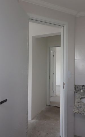 Apartamento à venda com 55m², 2 quartos e 2 vagasBanheiro da Suíte