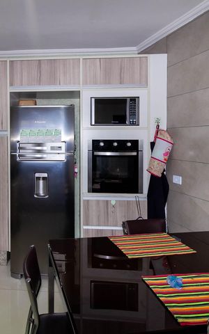 Casa à venda com 195m², 3 quartos e 2 vagas Casa à venda com 195m², 3 quartos e 2 vagasCozinha