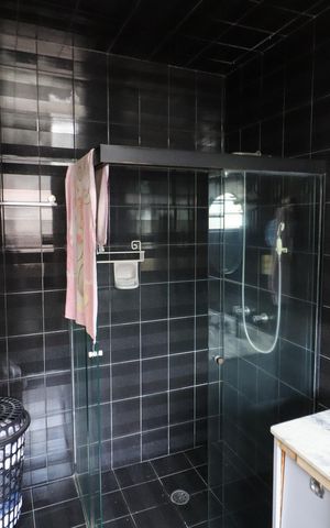 Casa à venda com 279m², 4 quartos e 3 vagasBanheiro da Suíte 1