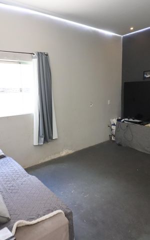 Casa à venda com 279m², 4 quartos e 3 vagasSala