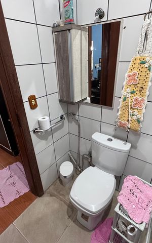 Casa à venda com 200m², 3 quartos e 2 vagas Casa à venda com 200m², 3 quartos e 2 vagasBanheiro