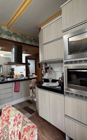 Casa à venda com 200m², 3 quartos e 2 vagas Casa à venda com 200m², 3 quartos e 2 vagasCozinha