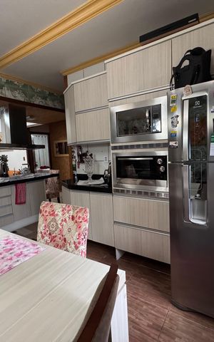 Casa à venda com 200m², 3 quartos e 2 vagas Casa à venda com 200m², 3 quartos e 2 vagasCozinha