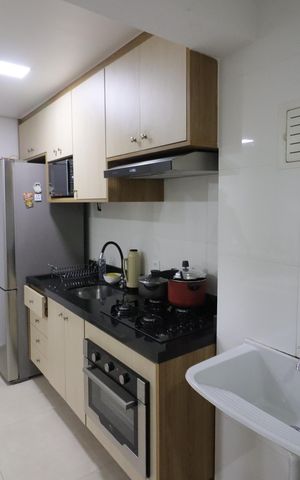 Apartamento à venda com 48m², 2 quartos e 1 vagaCozinha e Área de Serviço