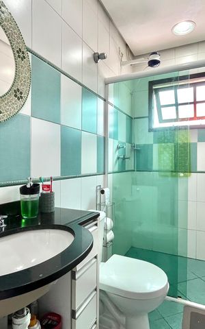 Casa à venda com 128m², 3 quartos e 4 vagas Casa à venda com 128m², 3 quartos e 4 vagasBanheiro da Suíte