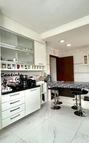 Casa à venda com 128m², 3 quartos e 4 vagas Casa à venda com 128m², 3 quartos e 4 vagasCozinha