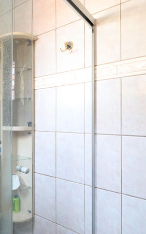 Casa à venda com 300m², 6 quartos e 2 vagasBanheiro da Suíte 2