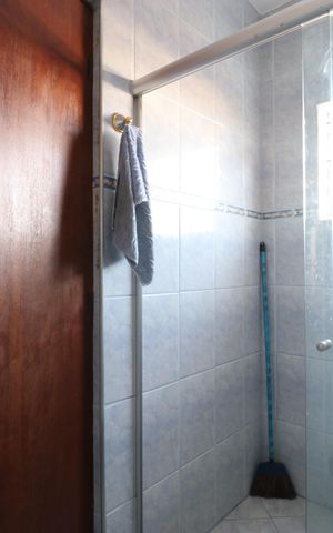Casa à venda com 300m², 6 quartos e 2 vagasBanheiro da Suíte 1