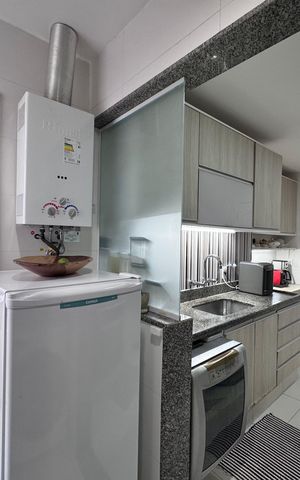 Apartamento à venda com 130m², 3 quartos e 3 vagas Apartamento à venda com 130m², 3 quartos e 3 vagasCozinha e Área de Serviço