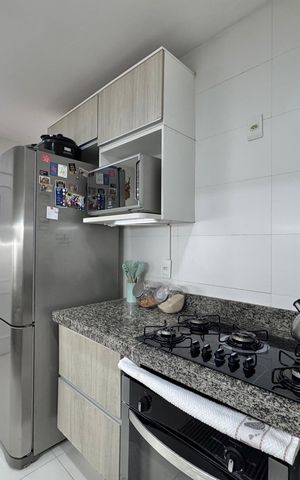 Apartamento à venda com 130m², 3 quartos e 3 vagas Apartamento à venda com 130m², 3 quartos e 3 vagasCozinha e Área de Serviço