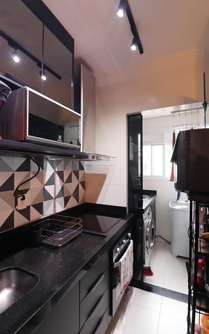 Apartamento à venda com 52m², 2 quartos e 1 vagaCozinha e Área de Serviço