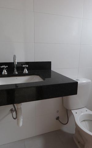Casa à venda com 107m², 3 quartos e 3 vagasBanheiro da Suíte