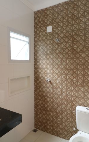 Casa à venda com 107m², 3 quartos e 3 vagasBanheiro